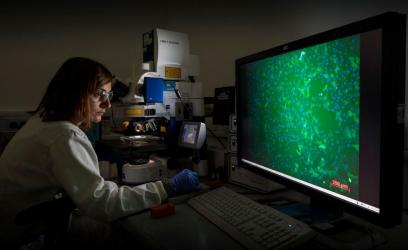 Researcher using some biomedical engineering equipment