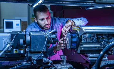 An engineering student using Mu-VIS X-ray imaging equipment