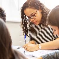 undergraduate history students studying in a classroom