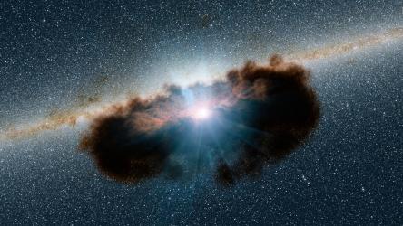 A growing supermassive black hole, one of the most obscured known, meaning it is surrounded by extremely thick clouds of gas and dust