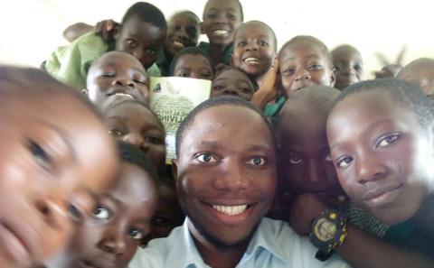 Okanda with some of his pupils