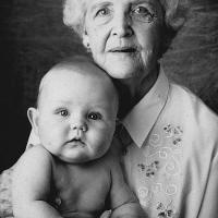 An old woman with a baby on her arms