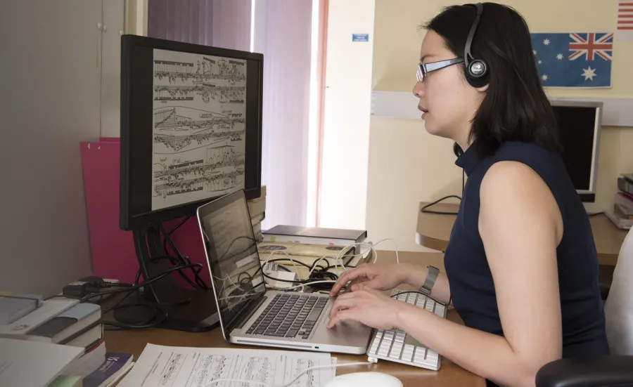 Music student using a laptop